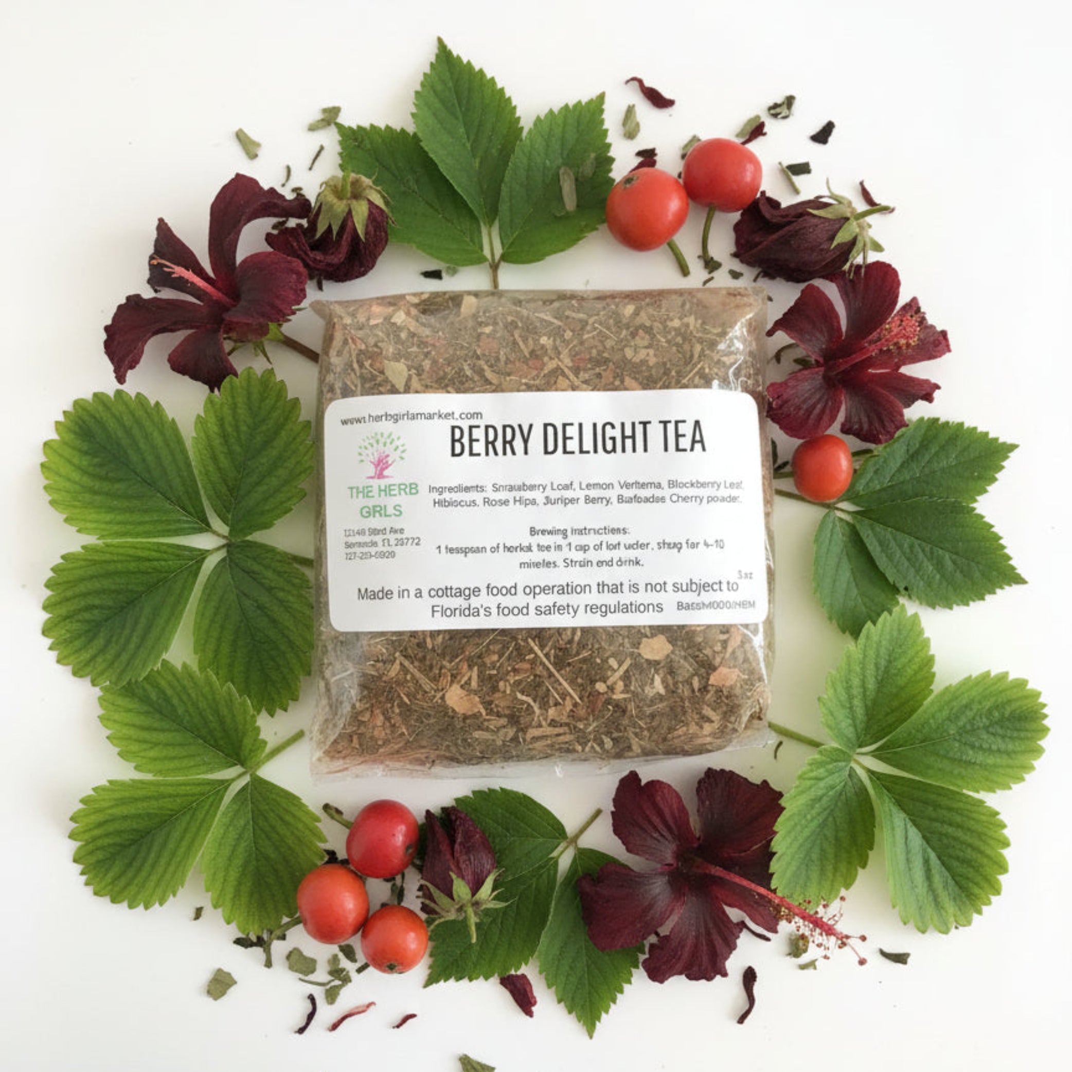 Packaged berry delight tea with a label on a white background