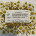 Packaged chamomile tea with a label on a white background
